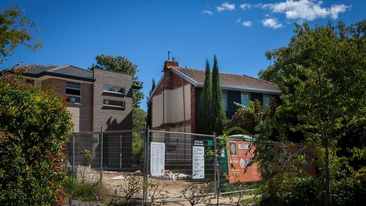 Owner of one half of a classic Canberra duplex is angry about their neighbour demolishing the other half in Fraser Place, Yarralumla. Photo: Katherine Griffiths