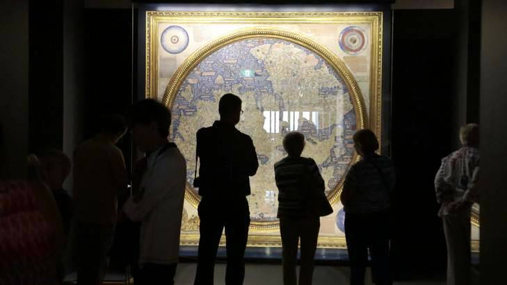 Visitors take a look at the map of the world 1448-1453 by Fra Mauro. Photo: Jeffrey Chan