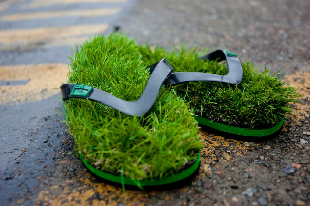 No need to keep your Kusa flip flops watered and mown, the grass is fake (but feels very real!) Photo: Shane Talbot