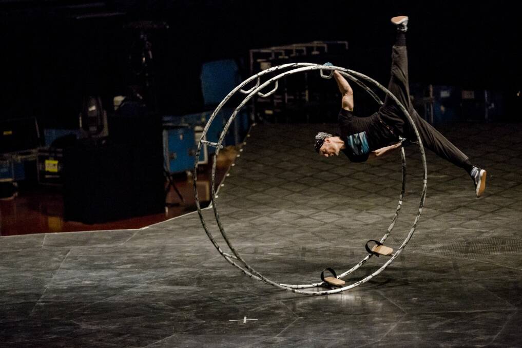 Cory Sylvester performs on the German wheel in preparation for Quidam. Photo: Jamila Toderas