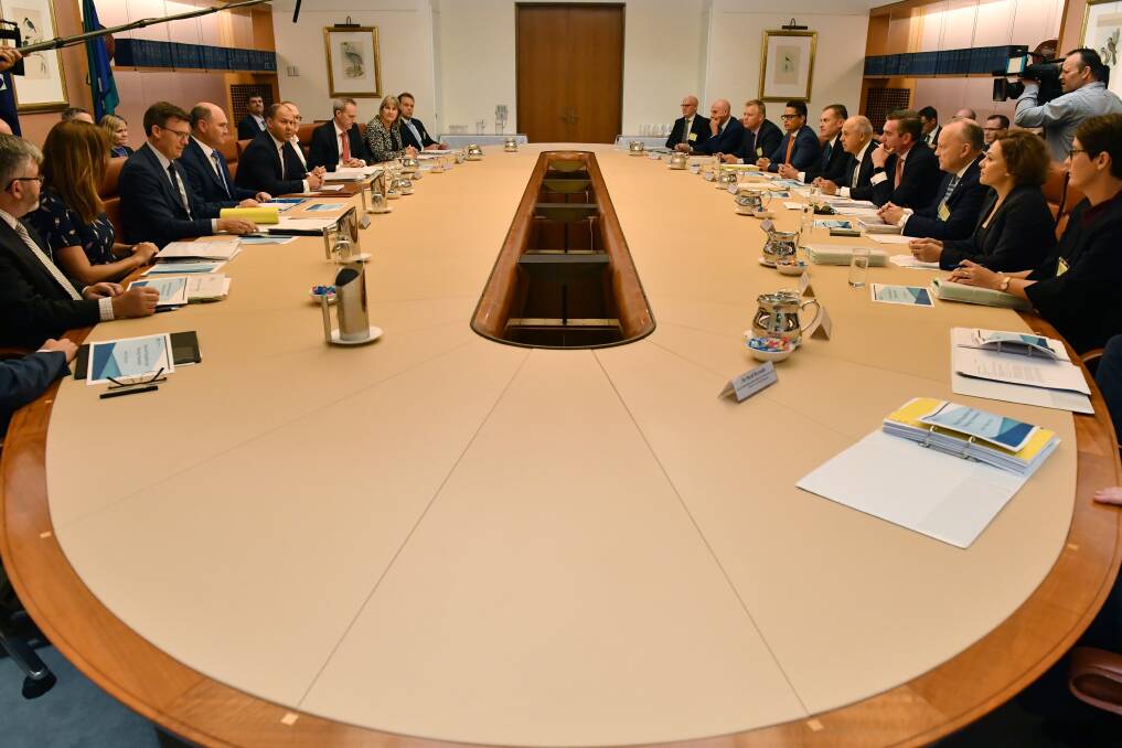 The state treasurers meet with Mr Frydenberg in Canberra. Photo: AAP/Mick Tsikas