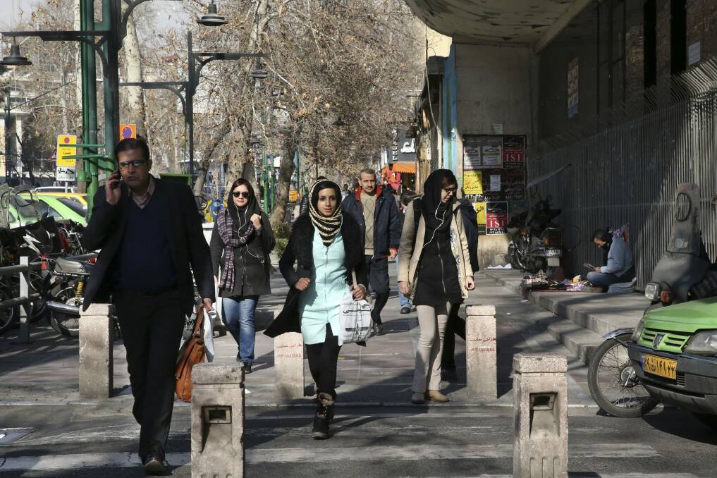 A street in central Tehran. "People are friendly and helpful, and it's far more liberal than I'd expected." Photo: Vahid Salemi