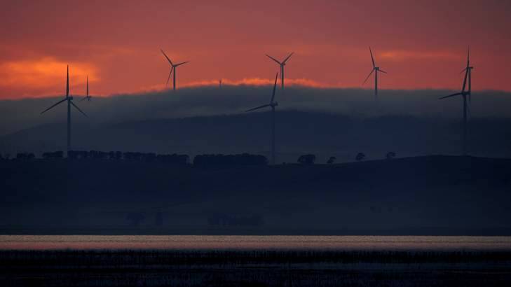 <i>The Canberra Times</i> photographer, Stuart Walmsley's Turneresque photograph of wind turbines over Lake George. Photo: Stuart Walmsley