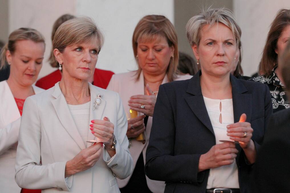 Foreign Affairs Minister Julie Bishop and Deputy Opposition Leader Tanya Plibersek during a candlelight vigil for Andrew Chan and Myuran Sukumaran in February.  Photo: Alex Ellinghausen