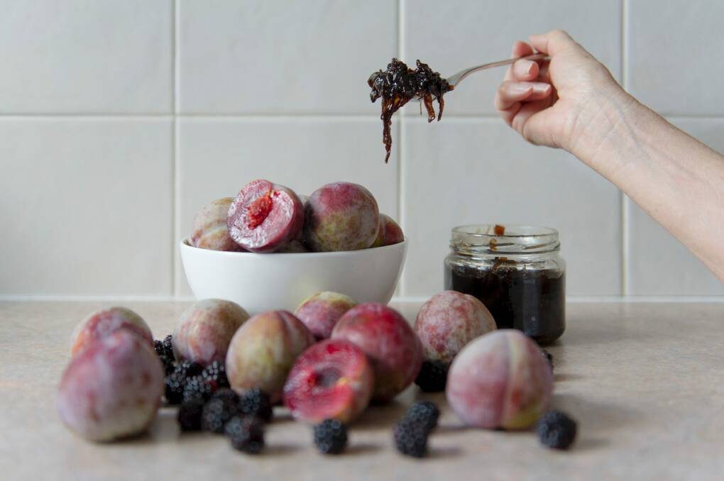 Bowl of plums and plum and onion chutney. Photo: Jay Cronan