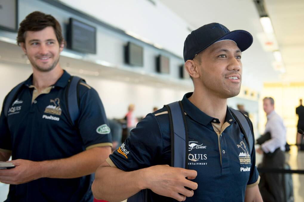 Brumby Christian Lealiifano surprises team members at the airport before leaving with the squad to New Zealand. Photo: Jay Cronan