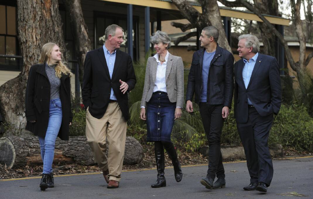 Philanthropists, Graham and Louise Tuckwell with Tuckwell Scholars Sarah Campbell (left) and Nishanth Pathy (second from right) and ANU vice-chancellor Brian Schmidt (far right) Photo: Graham Tidy 