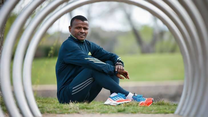 His daughter's illness has spurred champion runner Gemechu Woyecha to be in The Canberra Times Fun Run. Photo: Katherine Griffiths
