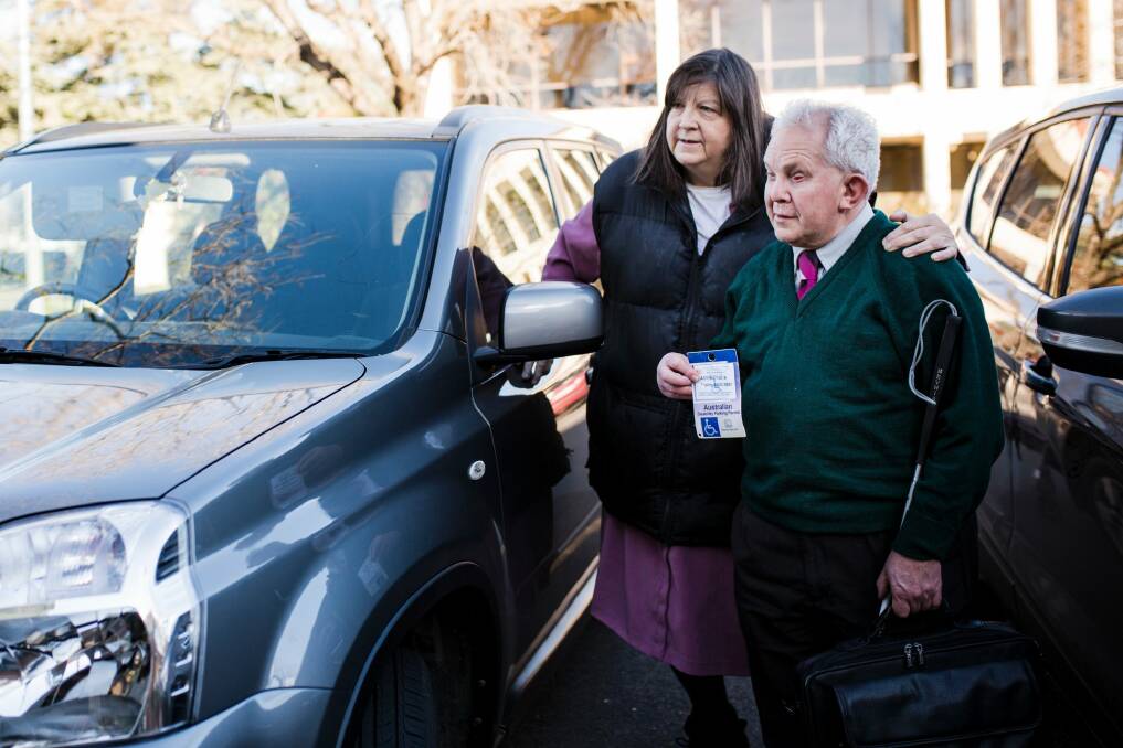 The fine for parking illegally in a disabled parking spot has increased by almost 70 per cent to $600. People with Disabilities ACT executive officer Robert Altamore who is blind, with his wife Wendy who is an amputee, have welcomed the move. Photo: Jamila Toderas