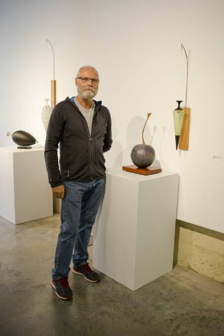 Nick Mount from Adelaide, with some of his artwork at the Canberra Glassworks Photo: Jamila Toderas