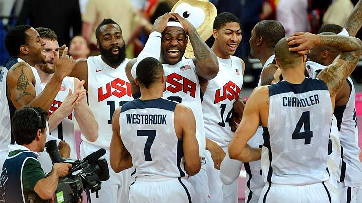 King James holds court ... LeBron James and his team celebrate their gold-medal win against a tough Spain outfit. Photo: Pat Scala