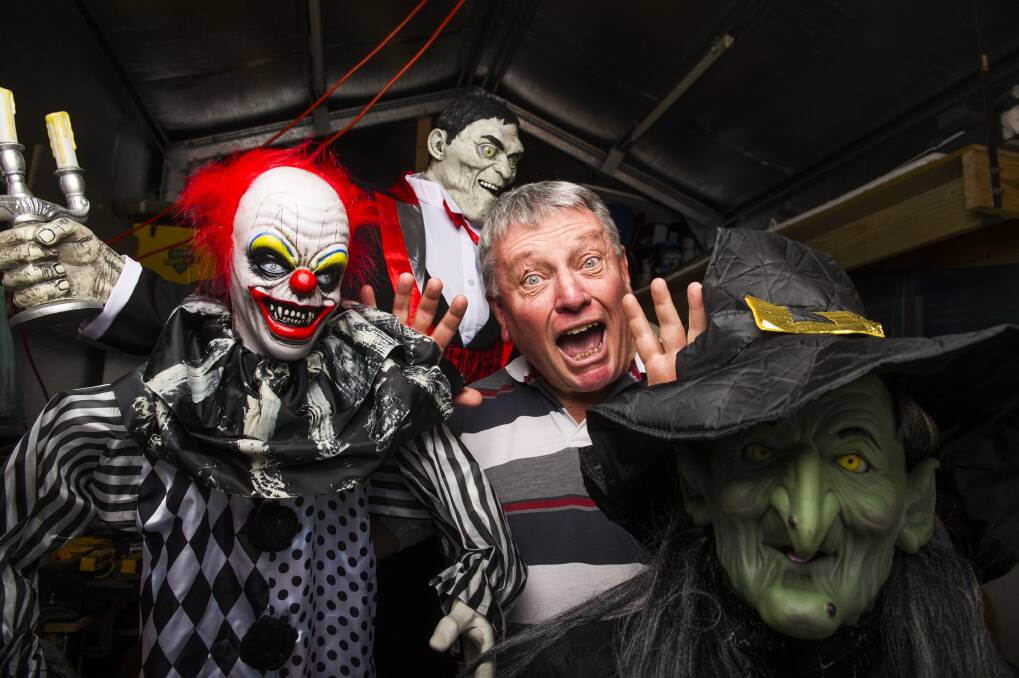 Ian Warburton and his Halloween home in Canberra. Photo: Dion Georgopoulos