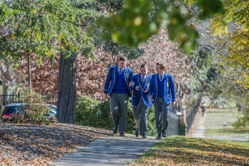 St Edmunds College student John-Paul Romano (centre) was suspending for trying to organise the student protest. His fellow Year 12 students Daniel Elix (left) and Jeremy Colbertaldo, say they supported John-Paul but were not suspended. Photo: Karleen Minney
