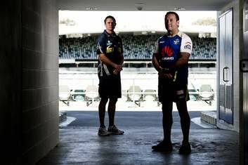 Brumbies coach Stephen Larkham and Canberra Raiders coach Ricky Stuart. Photo: Jay Cronan