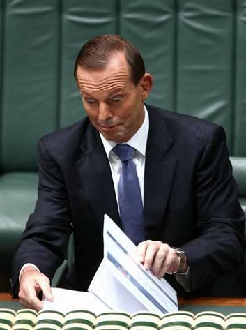 "The stress that I want to keep on everything is we will keep our commitments." Prime Minister Tony Abbott. Photo: Alex Ellinghausen