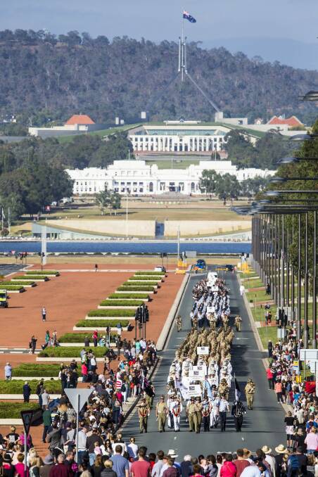 The Operation SLIPPER welcome home parade marches down Anzac Parade, Canberra.
 Photo: Photo by Matt Bedford