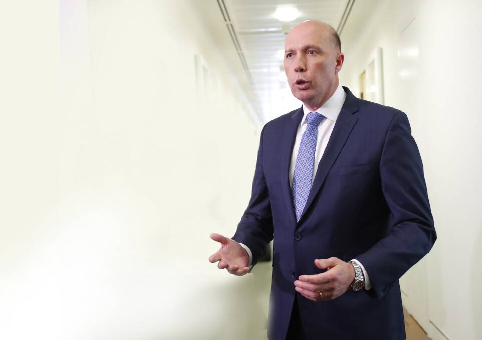 Peter Dutton, pictured after his unsuccessful challenge, could struggle to win his seat of Dickson at the next election, say political experts. Photo: David Gray