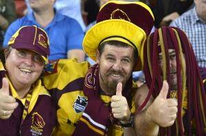 Bumper crowd: Broncos fans show their support during the match against North Queensland at Suncorp Stadium on Friday night. Photo: Fairfax Media