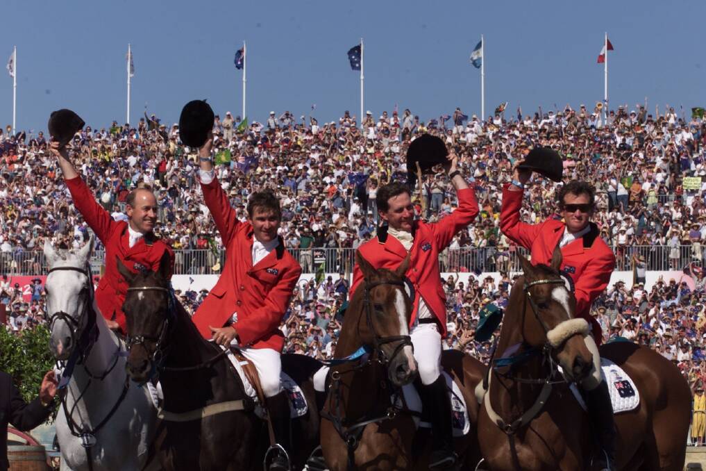 Australia celebrate gold at the Sydney 2000 Olympics, Stuart Tinney far right.
