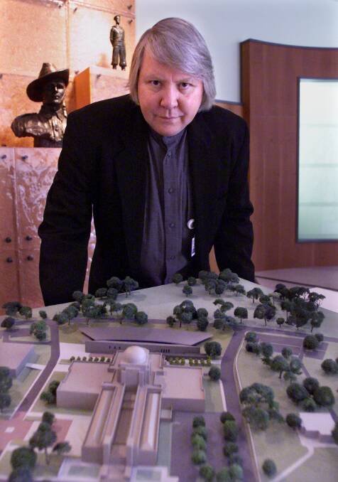 Architect John Denton (pictured in 1999) with designs for the Anzac Hall. Photo: Paul Harris