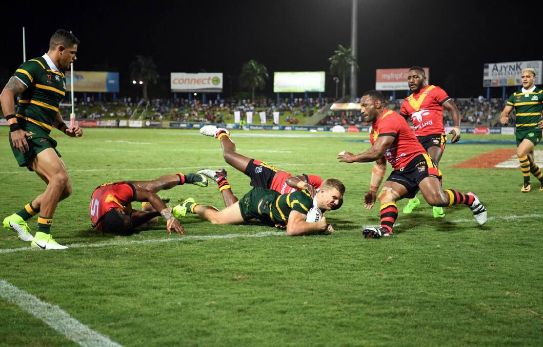 Unstoppable: Tom Trbojevic dives over for the Kagaroos in Suva. Photo: NRL Photos