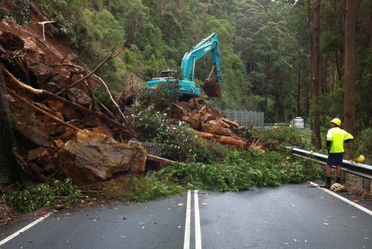 Excavation works continued yesterday at the landslip on the Kings Highway. Photo: NSW Roads and Maritime Services