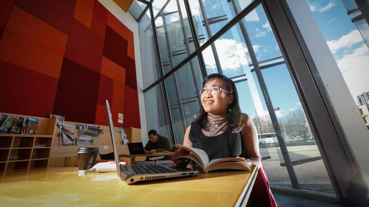 Kim Nguyen visits the library often to borrow books and use the free WIFI for study. Photo: Katheirne Griffiths