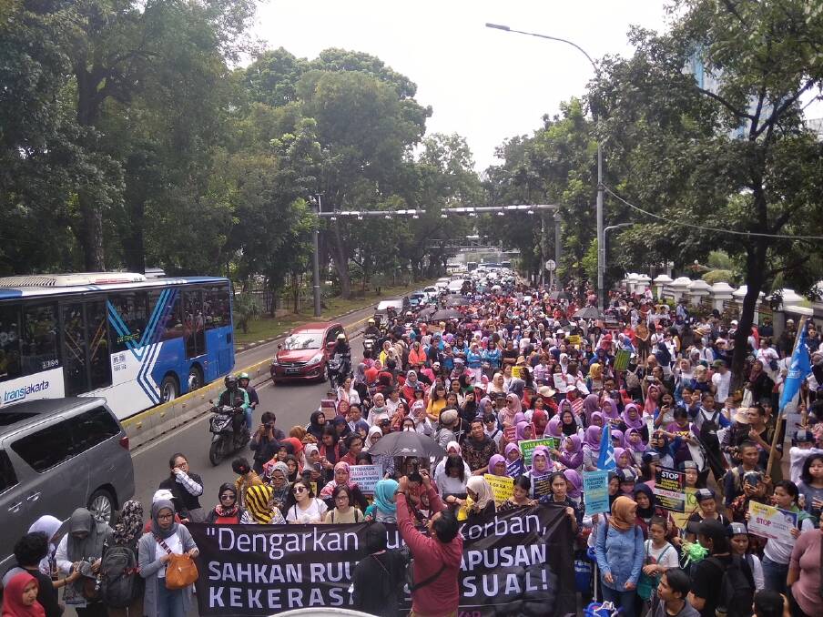 About 2000 people march in Indonesia earlier this month to push for a law to eradicate sexual violence. 
 Photo: Supplied