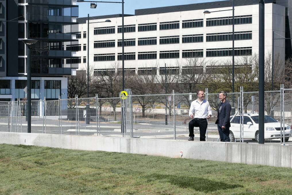 Chief Minister Andrew Barr and SHL Development CEO Terry Shaw look at the landscaping work at the Campbell 5 development opposite the ASIO headquarters.   Photo: Jeffrey Chan