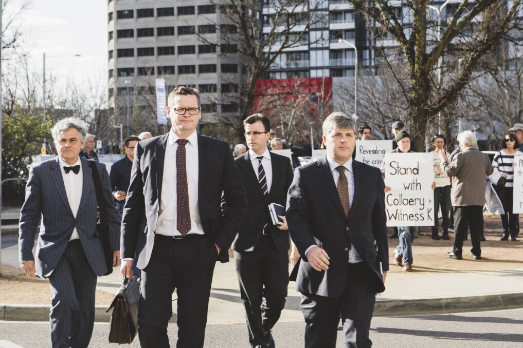 Mr Collaery's barrister Christopher Ward SC, far right, and Witness K's barrister Haydn Carmichael, far left, arriving at court earlier this year. Photo: Jamila Toderas