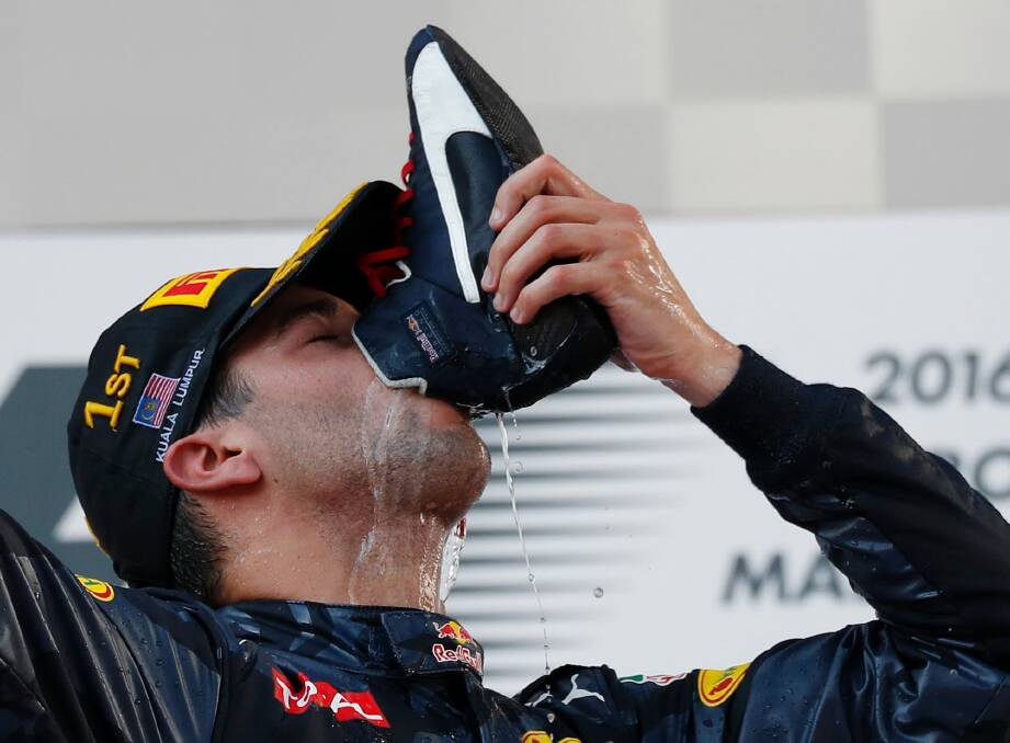 Daniel Ricciardo made the 'shoey' one of the contenders for word of the year. Photo: AP