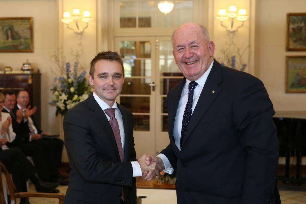 Wyatt Roy (left) with Governor-General Sir Peter Cosgrove, is only two days into his new role but has already spoken to industry leaders. Photo: Andrew Meares