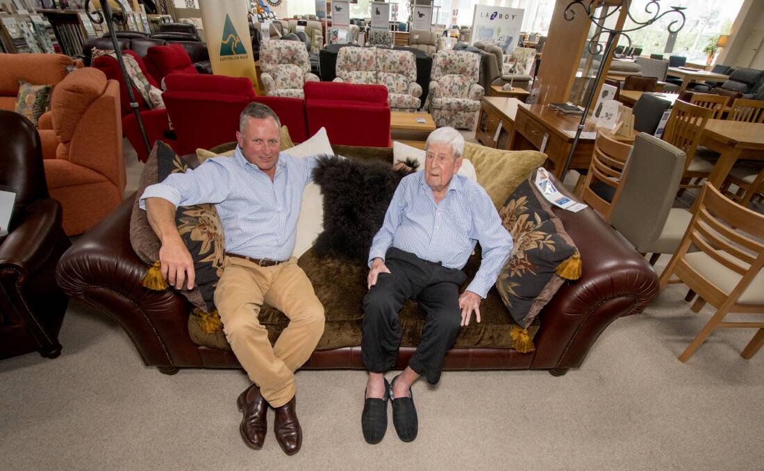 Peter Cusack and his father David, 88, in the Fyshwick showroom of Cusacks Furniture. Photo: Karleen Minney