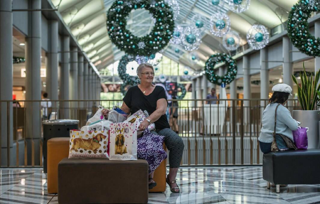 Sue Nelms of Kambah minds her granddaughters' shopping at the Canberra Centre. Photo: karleen minney