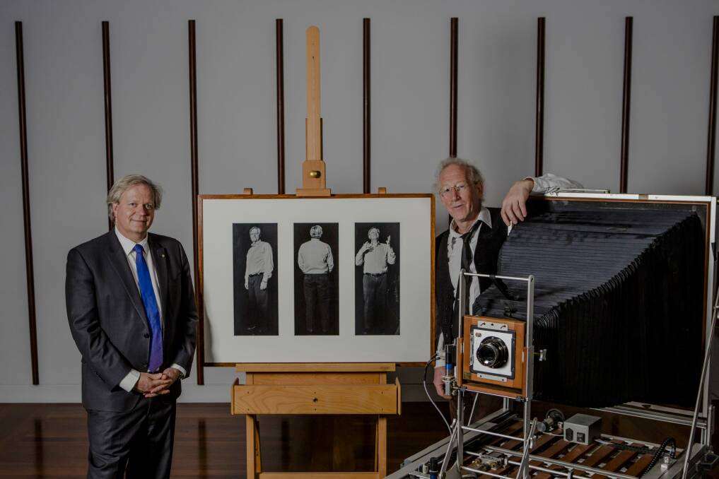 Professor Brian Schmidt and photographer David Roberts with the newly commissioned work for the National Portrait Gallery. Photo: Jamila Toderas