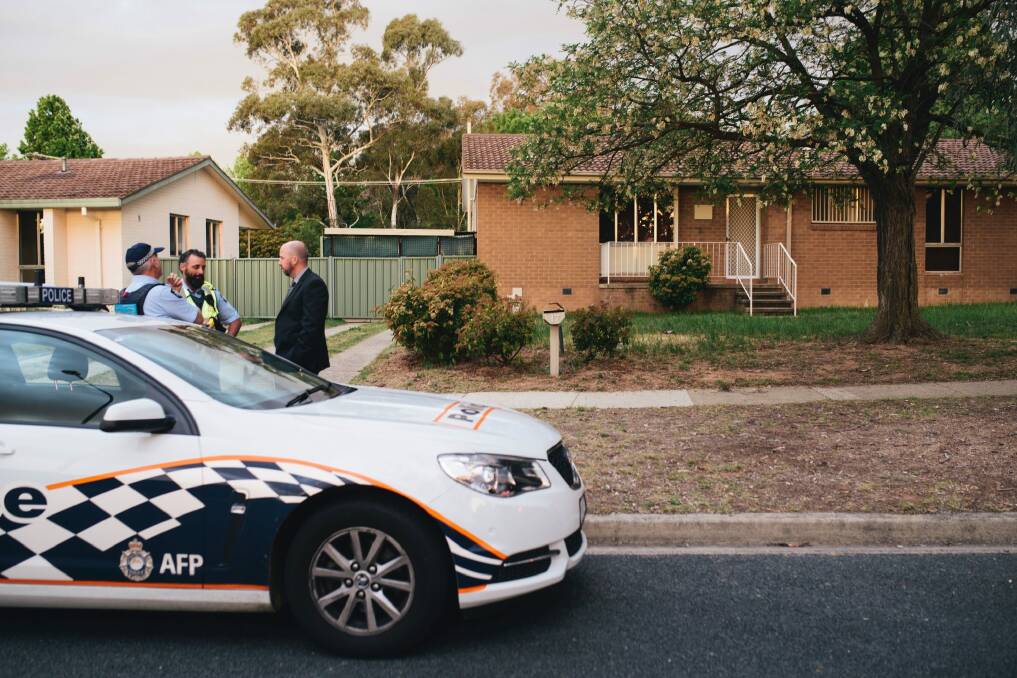 ACT police at the scene of a death following the use of a taser by police at a home in Waramanga. Photo: Rohan Thomson