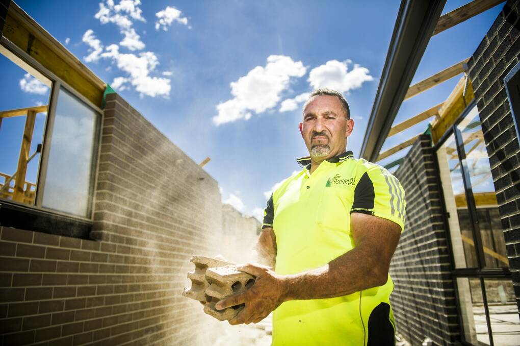 Harcourt Bricklaying owner Chris Gianchou, on a home in Casey, says small blocks were not favoured by either home owners or bricklayers. Photo: Photo by Rohan Thomson