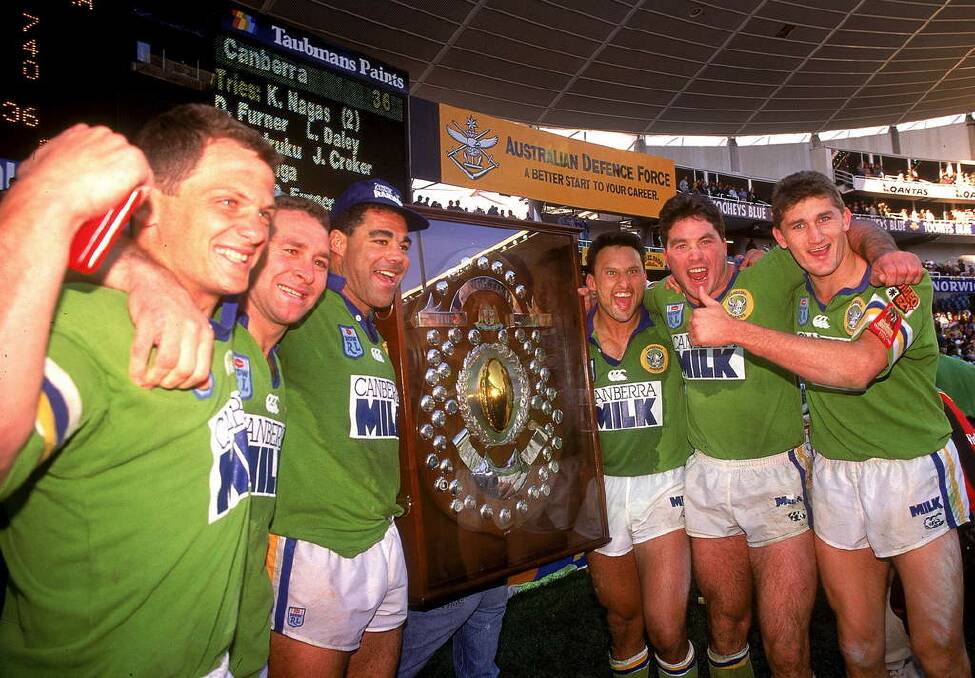 Steve Walters, Ricky Stuart, Mal Meninga, Laurie Daley, Bradley Clyde and Brett Mullins of the Raiders celebrate winning the 1994 title. Photo: Daniel Landon