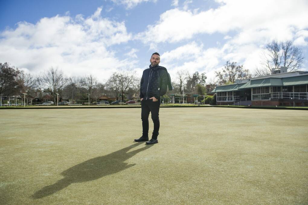 Nik Bulum at the Canberra City Bowling Club site after buying it last year. Photo: Jay Cronan