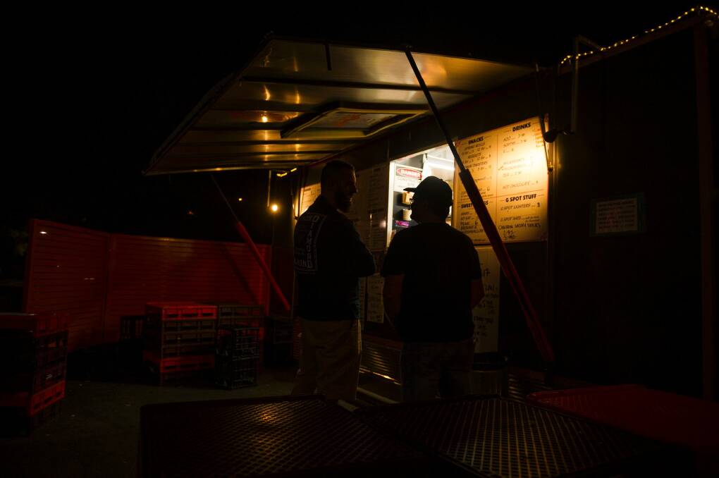 The G Spot owner Andrew Dale talks to a friend before he leave for the night. Photo: Dion Georgopoulos