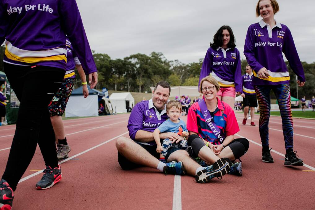Canberrans participate in the 2017 Relay For Life, with funds going towards Cancer Council ACT. Ben Robets and his wife Romy Collier with their son Dean 3-years old. Romy was diagnosed with breast cancer in 2014, and is now in remission.  Photo: Jamila Toderas