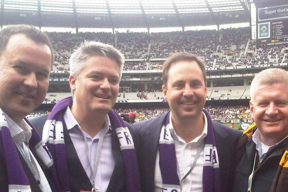 David Bushby, Mathias Cormann, Steve Ciobo and Mitch Fifield at the 2013 AFL grand final.