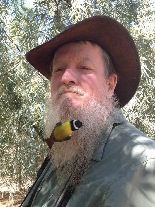 Canberra naturalist Ian Fraser and, yes, that is a bird in his beard. Photo: Picasa
