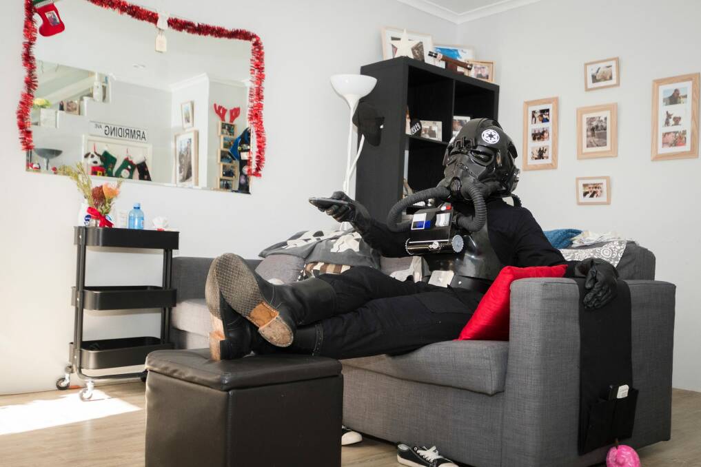Amy Armriding casually watches Star Wars in her TIE fighter pilot outfit. Photo: Dion Georgopoulos
