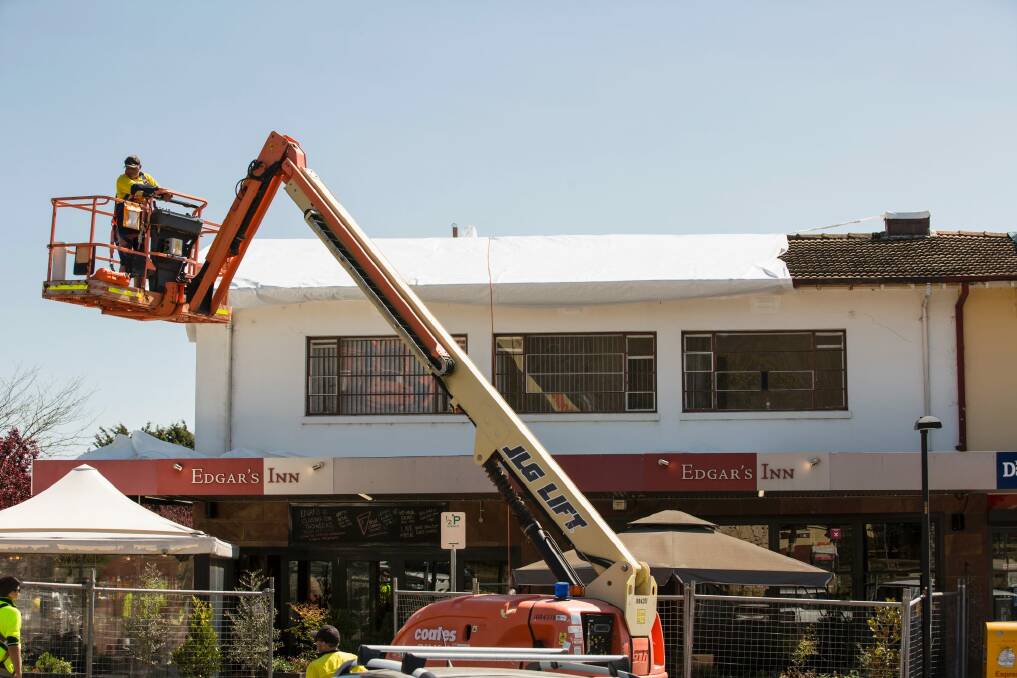 Mr Fluffy asbestos removal in progress at Ainslie Shops last October.  Photo: Jamila Toderas