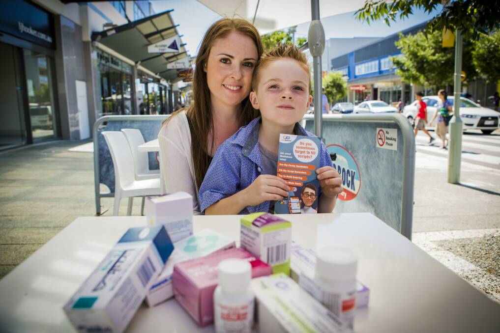 Hannah Thomson uses the MedAdvisor app for her son Vincent and for herself as she has to manage nearly 20 prescriptions. Photo: Jamila Toderas