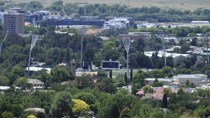 The last of the six lighting towers at Manuka Oval was erected on Saturday. Photo: Graham Tidy