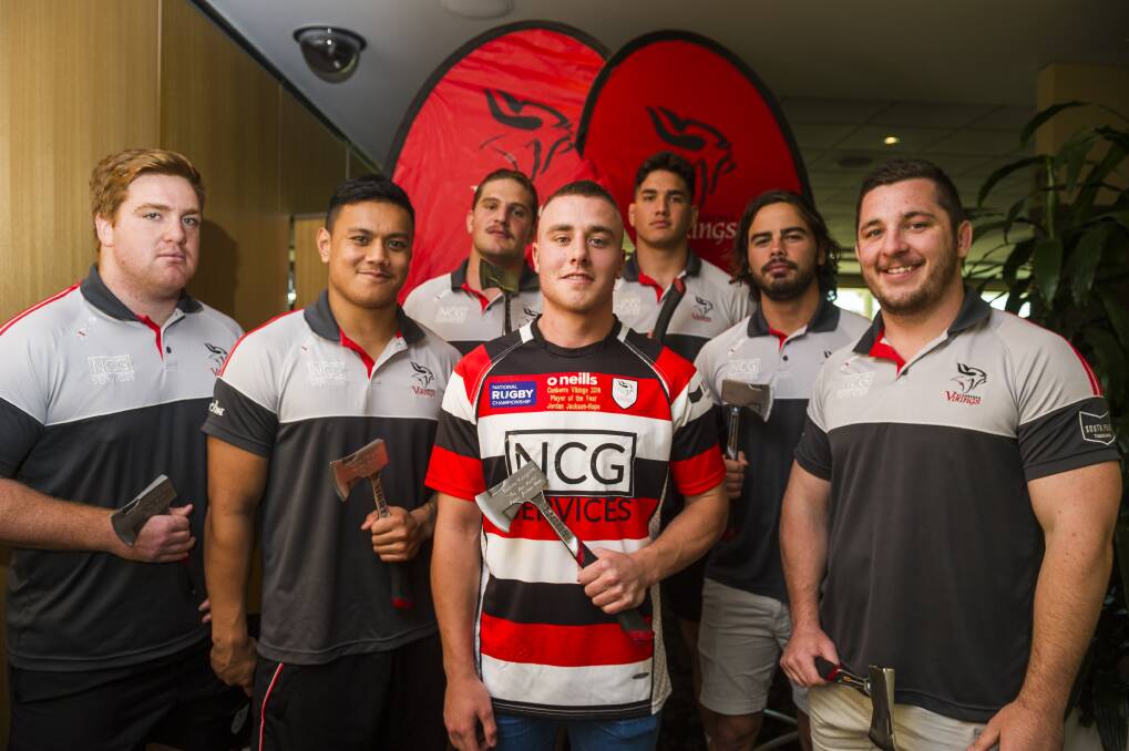 Jordan Jackson-Hope and Vikings teammates with their player of the match axe awards. Photo: Dion Georgopoulos