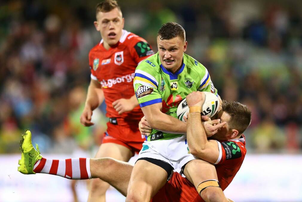 Jack Wighton, of the Raiders, is tackled during match against St George Illawarra Dragons. Photo: Mark Nolan