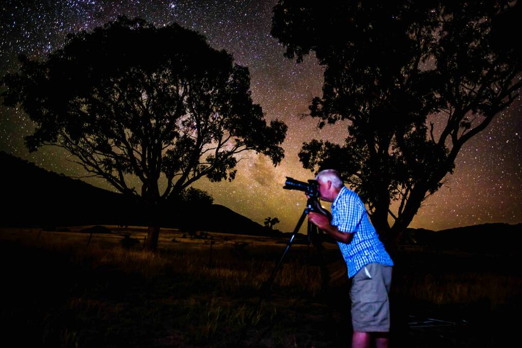Calwell resident, Ian Williams captures ''air glow'' another colourful natural phenomenon in our night sky, just out of Tuggeranong. Photo: Ian Williams